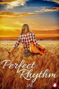 A warm-toned book cover for "Perfect Rhythm" by Jae. The image features a person with long blonde hair, seen from behind, wearing a red and white plaid shirt and blue jeans, sitting amidst a field of golden wheat or tall grasses. They are holding an acoustic guitar. The background is a vibrant orange, yellow, and blue sunset sky with soft clouds. The title "Perfect Rhythm" is in elegant white script in the bottom left, and the author's name, "JAE," is below it in white.